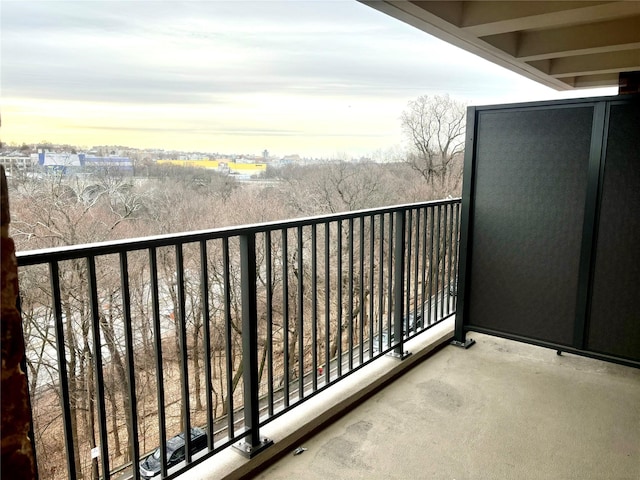 view of balcony at dusk