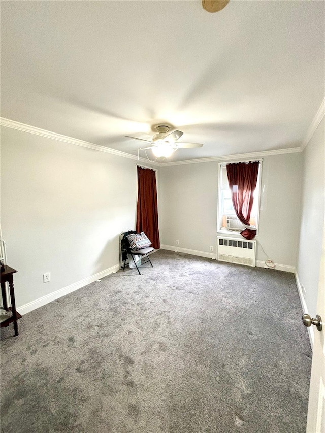 carpeted empty room featuring crown molding and ceiling fan