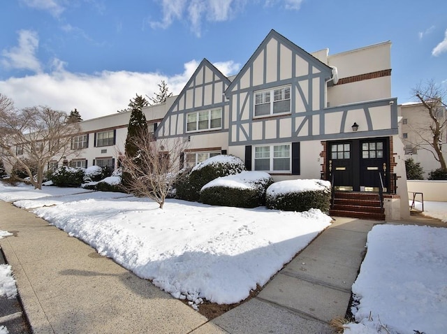 tudor home with french doors