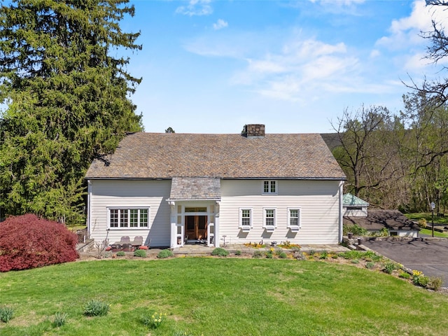 100 Pleasant Hill Rd, New Windsor, NY 12553 - view of front facade with a front lawn and a chimney