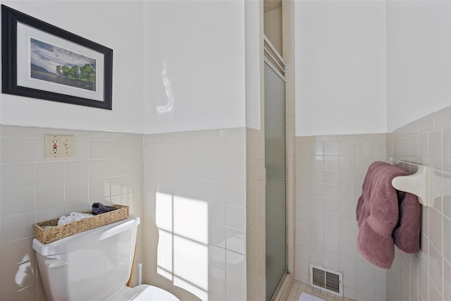 100 Pleasant Hill Rd, New Windsor, NY 12553 - full bathroom with tile walls, toilet, and a shower stall