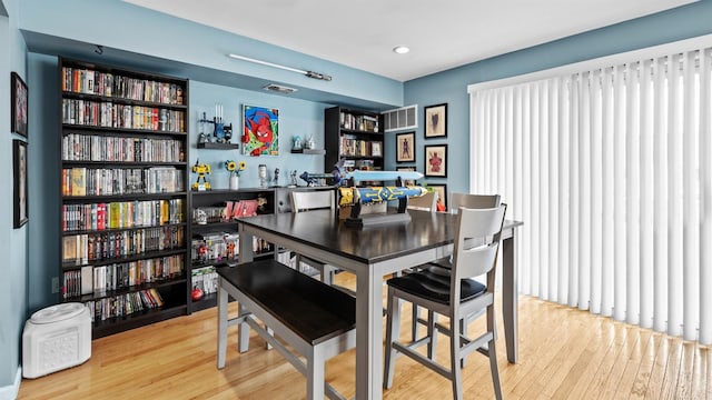 dining area with light hardwood / wood-style flooring