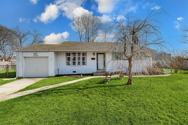 ranch-style house featuring a garage and a front yard