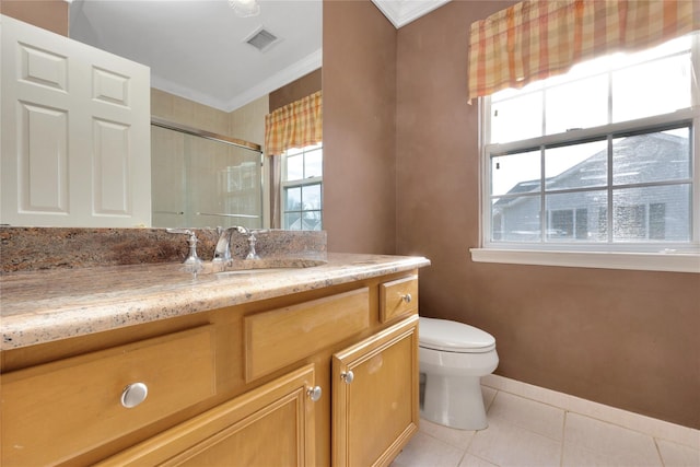 bathroom featuring a shower with shower door, ornamental molding, vanity, toilet, and tile patterned floors