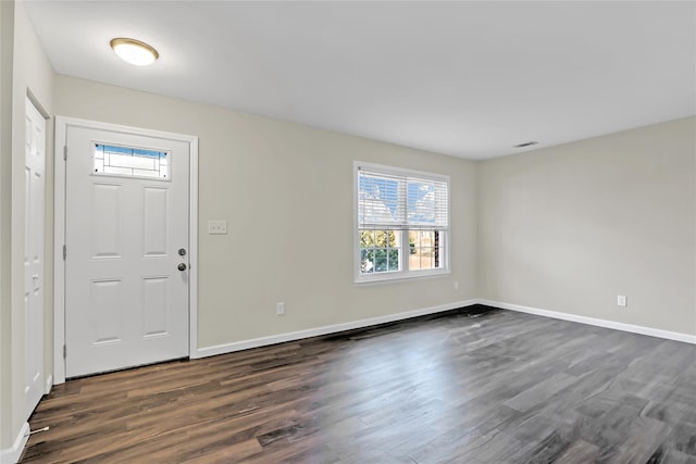 foyer entrance featuring dark hardwood / wood-style flooring