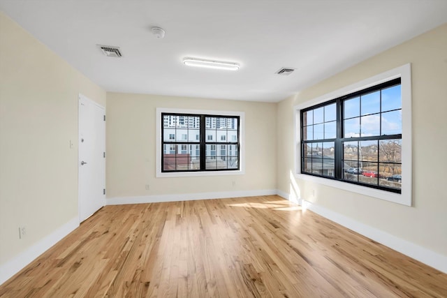 empty room featuring light hardwood / wood-style floors