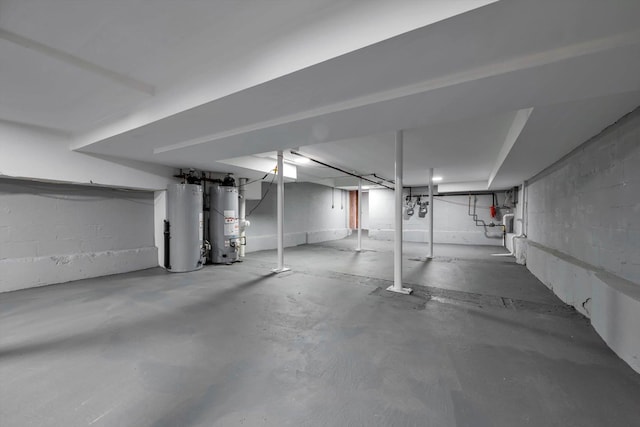 basement featuring gas water heater