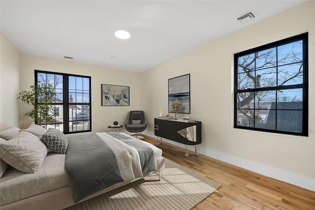 bedroom featuring hardwood / wood-style floors