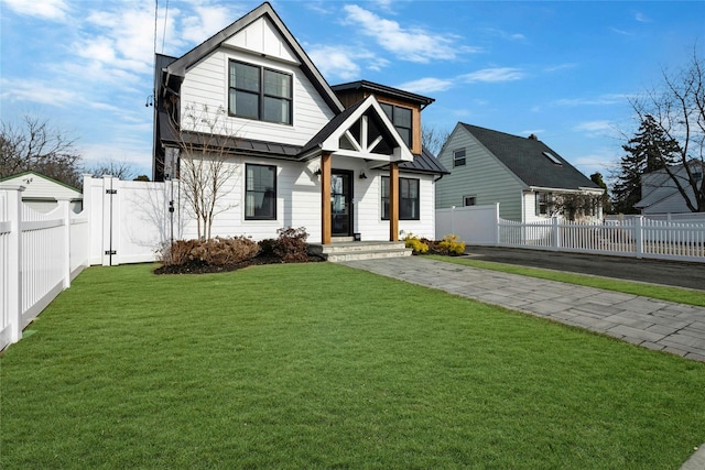 view of front of home with a front lawn