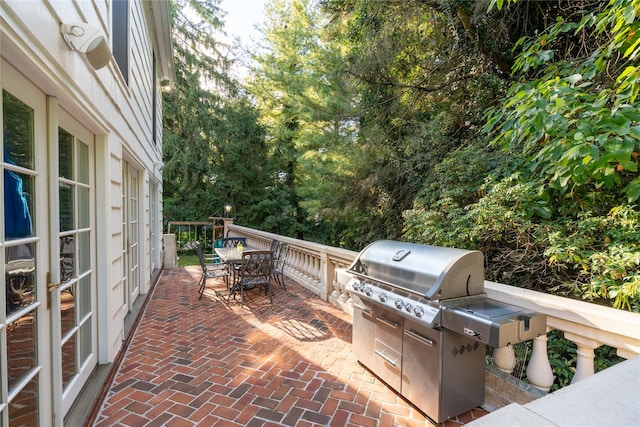 view of patio featuring a grill