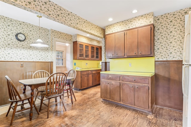 kitchen featuring light hardwood / wood-style floors and hanging light fixtures