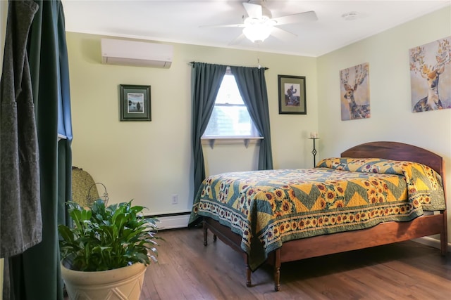 bedroom featuring ceiling fan, a wall mounted air conditioner, hardwood / wood-style floors, and a baseboard heating unit