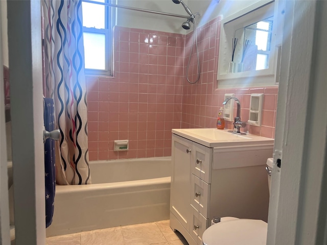 full bathroom with backsplash, tile patterned flooring, vanity, shower / tub combo, and toilet