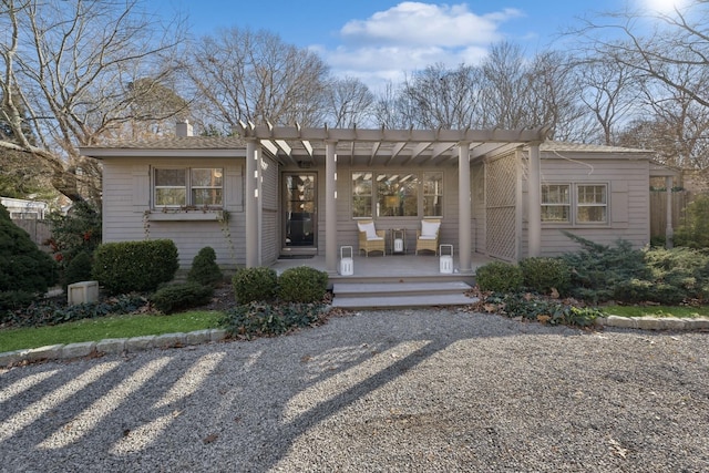 view of front of house featuring a pergola