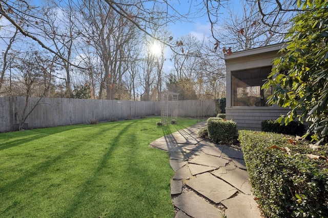 view of yard featuring a sunroom