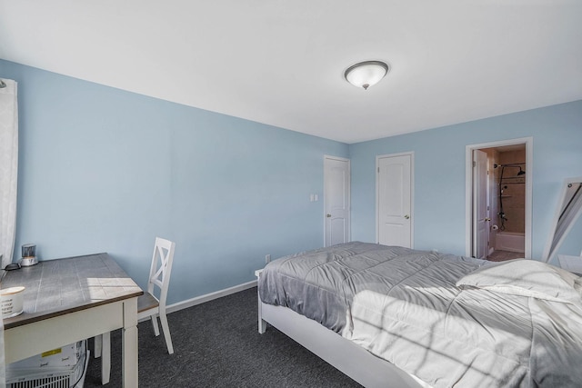 bedroom with dark colored carpet