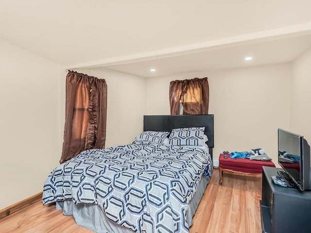 bedroom featuring hardwood / wood-style flooring