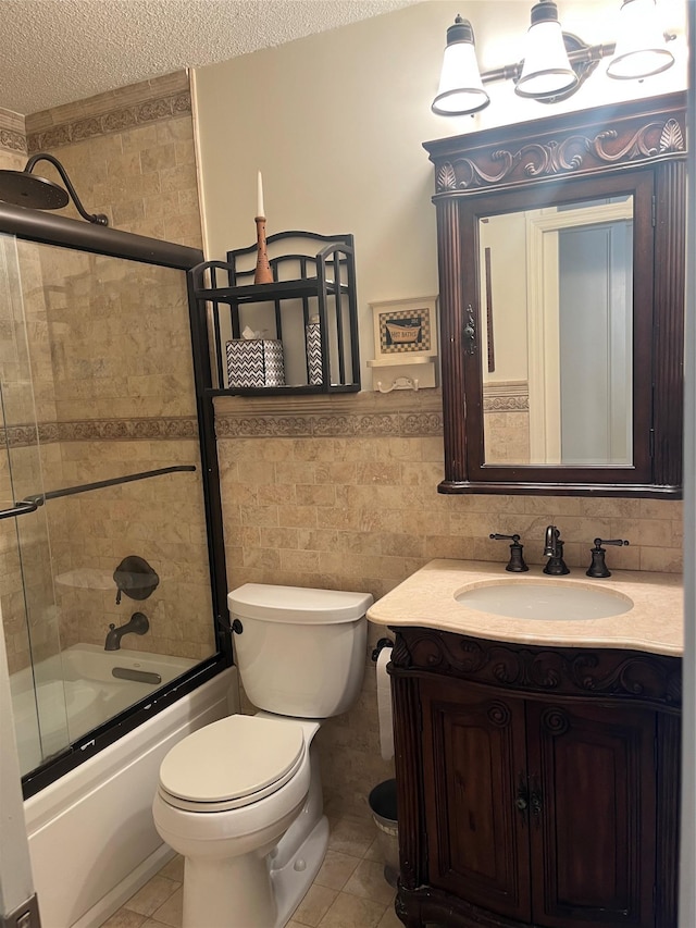 full bathroom with enclosed tub / shower combo, tile walls, tile patterned floors, and a textured ceiling