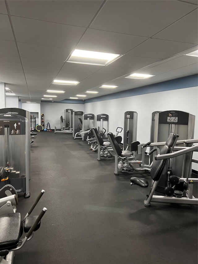 workout area with a drop ceiling