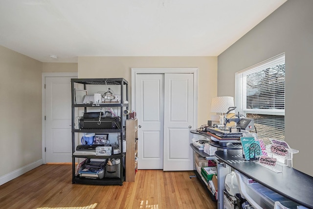 home office with light wood-type flooring