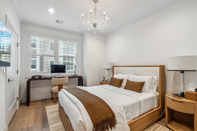 bedroom with multiple windows, crown molding, light hardwood / wood-style flooring, and an inviting chandelier