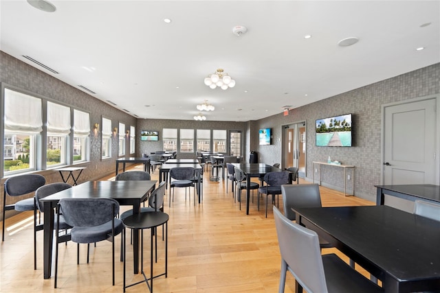 dining area with light hardwood / wood-style flooring