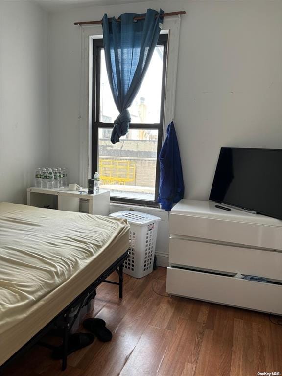 bedroom featuring hardwood / wood-style flooring