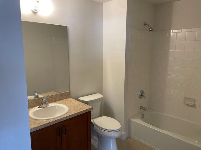 full bathroom featuring vanity, toilet, and tiled shower / bath combo