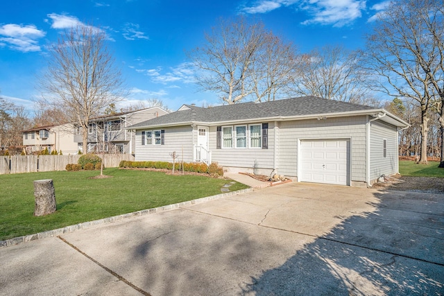 ranch-style house with a garage and a front lawn