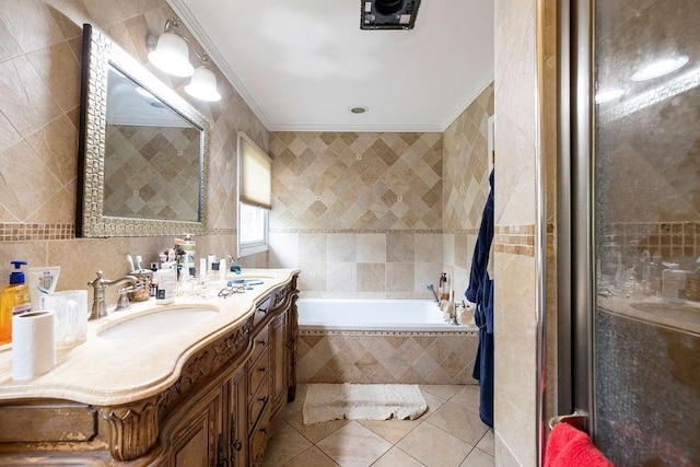 bathroom featuring tile walls, vanity, tile patterned flooring, and ornamental molding