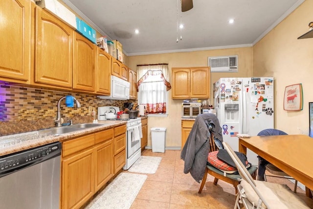 kitchen with crown molding, light tile patterned floors, backsplash, a sink, and white appliances