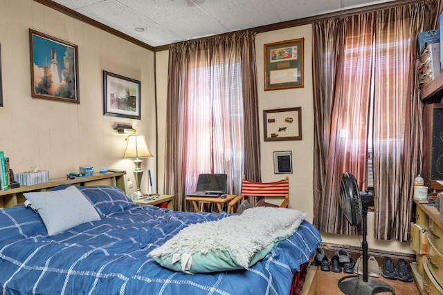 bedroom with ornamental molding