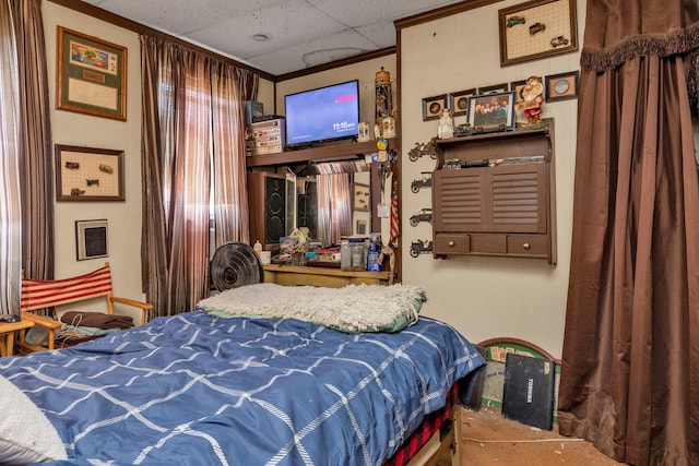 bedroom featuring a paneled ceiling