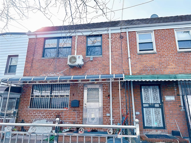 view of building exterior with ac unit