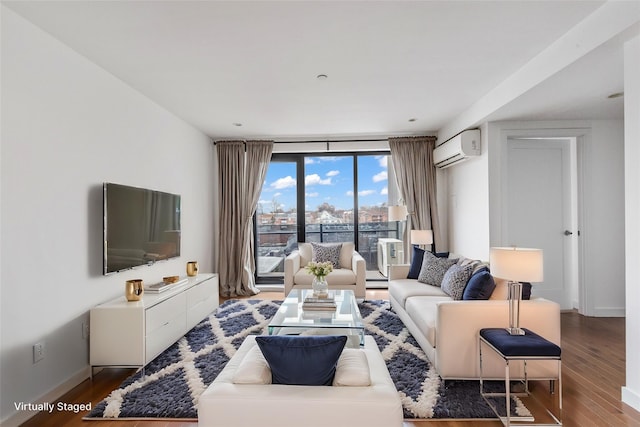 living room with dark wood-type flooring, floor to ceiling windows, and a wall unit AC