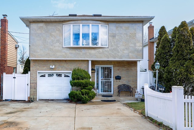 view of front of property featuring a garage