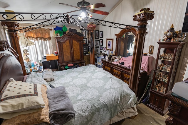 bedroom with lofted ceiling, carpet, and ceiling fan