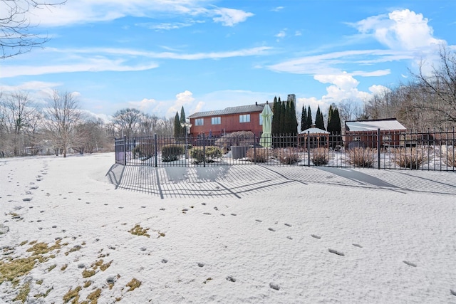 view of yard covered in snow