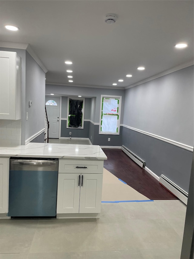 kitchen with baseboard heating, dishwasher, and white cabinets