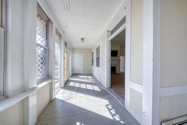 hall with light wood-style floors