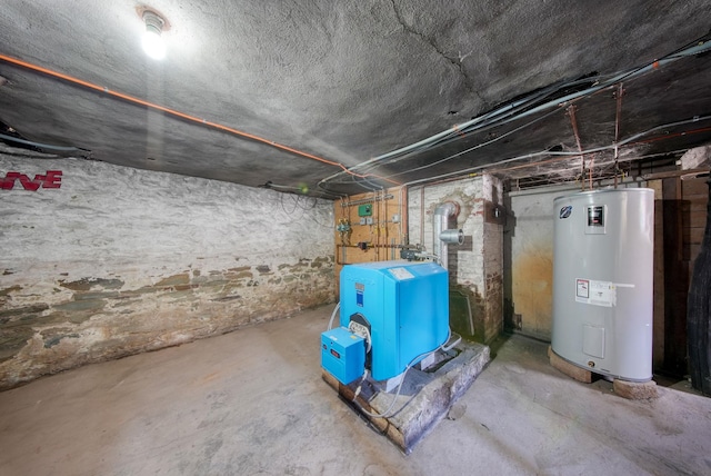 utility room with a heating unit and electric water heater