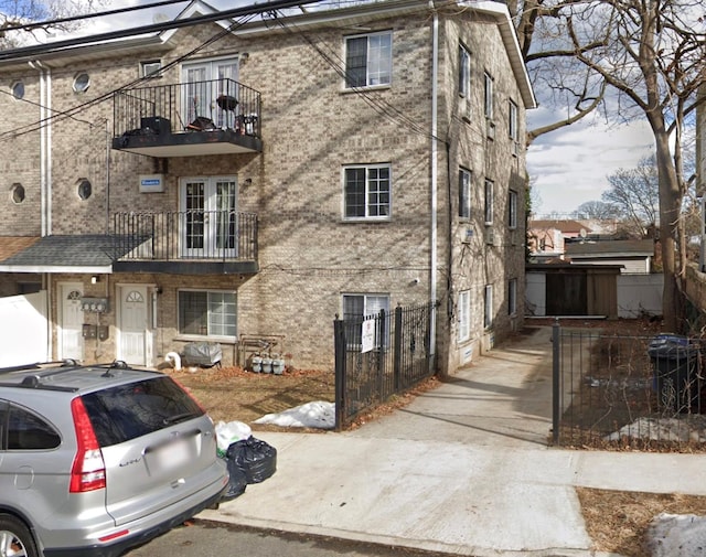 view of front of property with a balcony