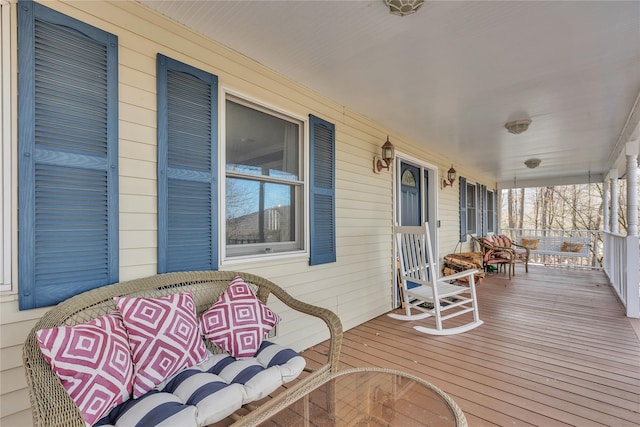 deck featuring covered porch