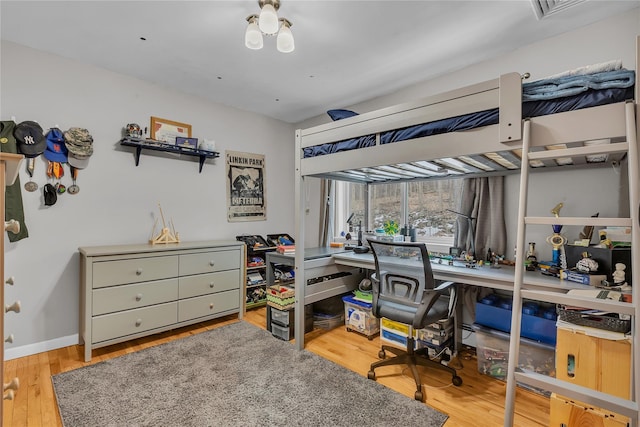 bedroom featuring light hardwood / wood-style flooring