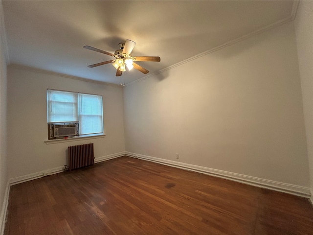 empty room with crown molding, dark wood-type flooring, ceiling fan, cooling unit, and radiator heating unit