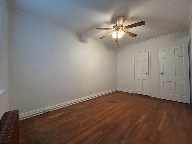 unfurnished bedroom with crown molding, ceiling fan, and dark hardwood / wood-style flooring