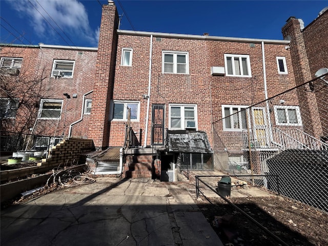 rear view of house featuring a patio area