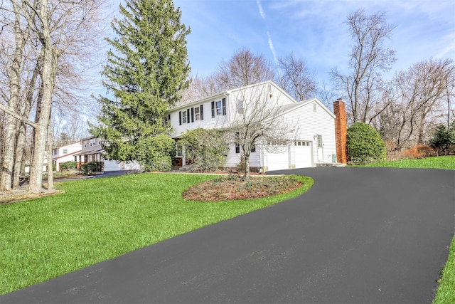 view of front of home featuring a front lawn