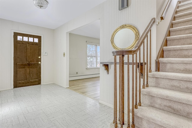 entryway with a baseboard radiator