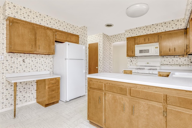 kitchen with white appliances and sink